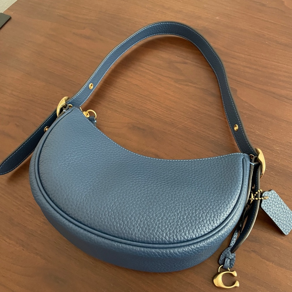 Brand new Coach crescent shaped purse